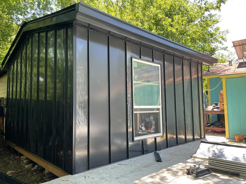 Black standing seam metal wall panels for Metal Roof Installation in Essex Junction